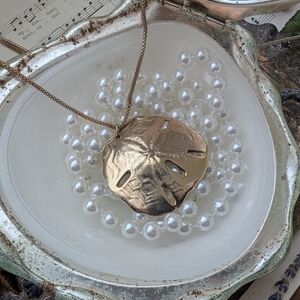 Gold Sand Dollar Pendant Necklace